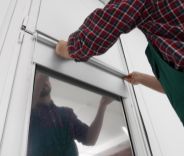 Bedroom window with roller shades