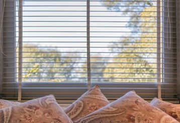 Cordless blinds and shades providing modern and sleek window coverings.